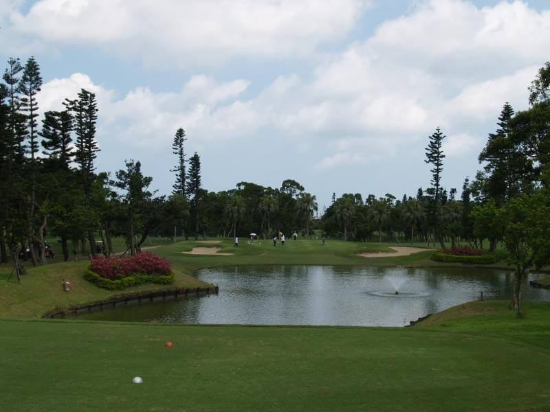 view of a water hazard and manicured green at the Linkou Golf Club