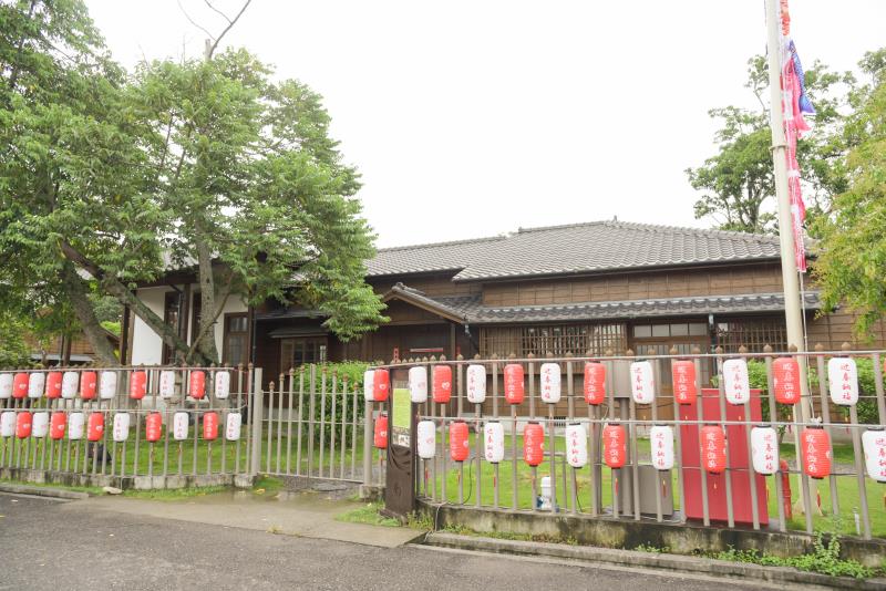 A traditional Japanese building with a tiled roof