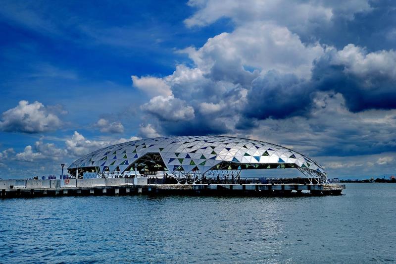 A modern, dome-shaped building with a geometric pattern
