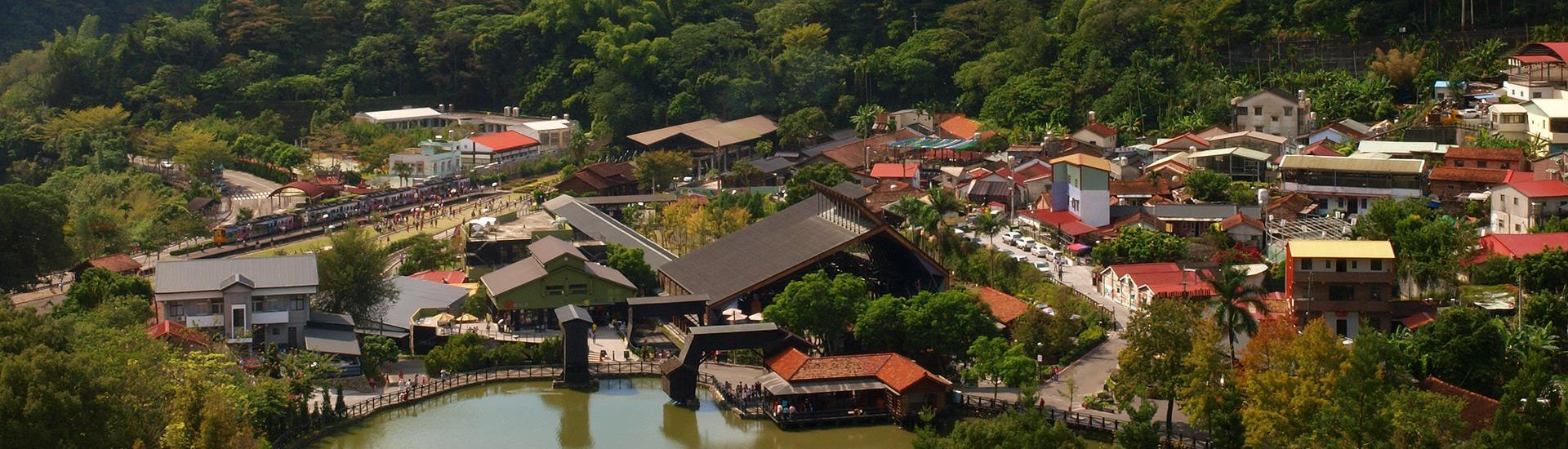 Sun Moon Lake serene waters surrounded by lush mountains in Nantou.