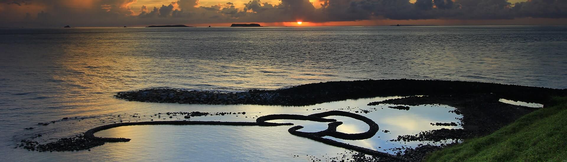 Crystal-clear turquoise waters and sandy beaches of Penghu Islands.